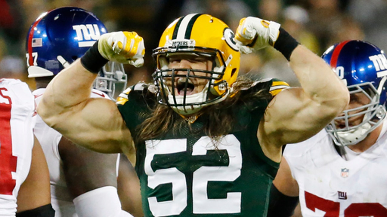 Offense choppy, Packers D gets to Giants in 23-16 win